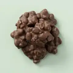 Ambachtelijke pinda/rozijnen rotsjes melk (400 gram)